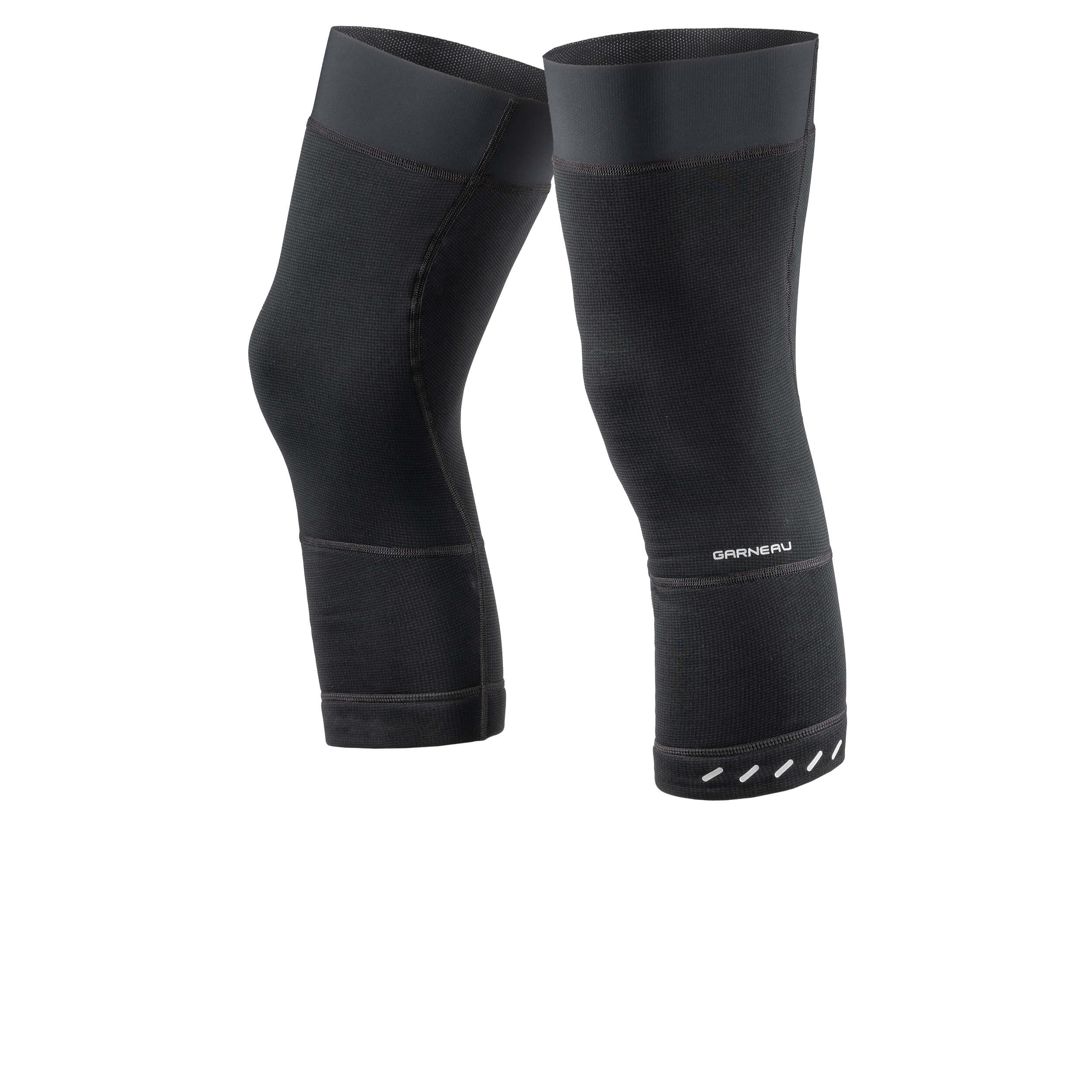 A pair of black knee warmers with a textured windbreaking fabric and reflective elements on the lower leg.